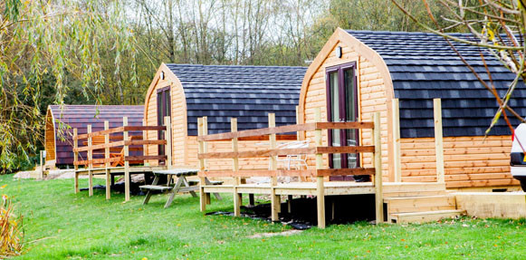 A collection of luxury glamping cabins.